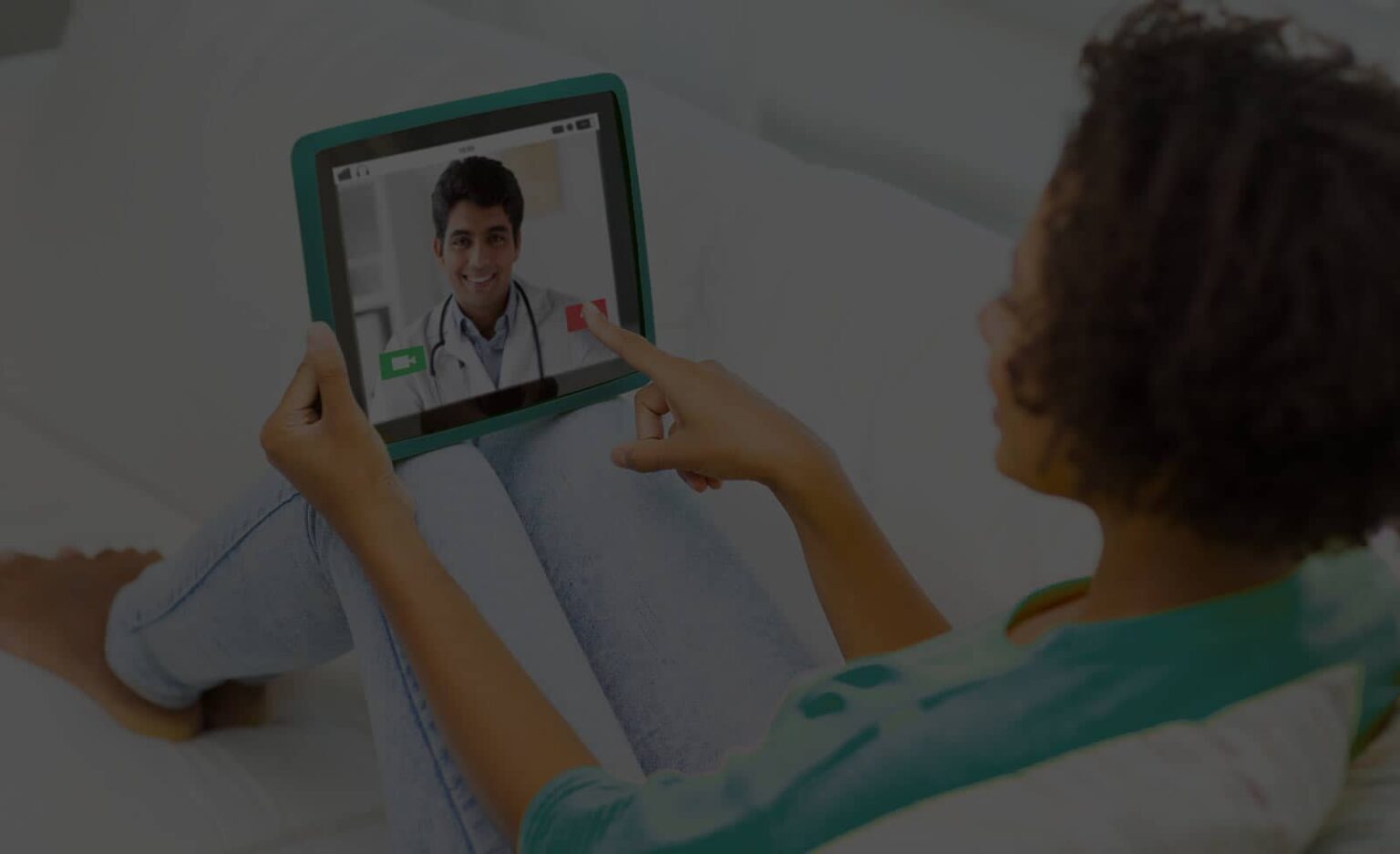 Patient consulting a doctor by video on a tablet, from PrestoDoctor